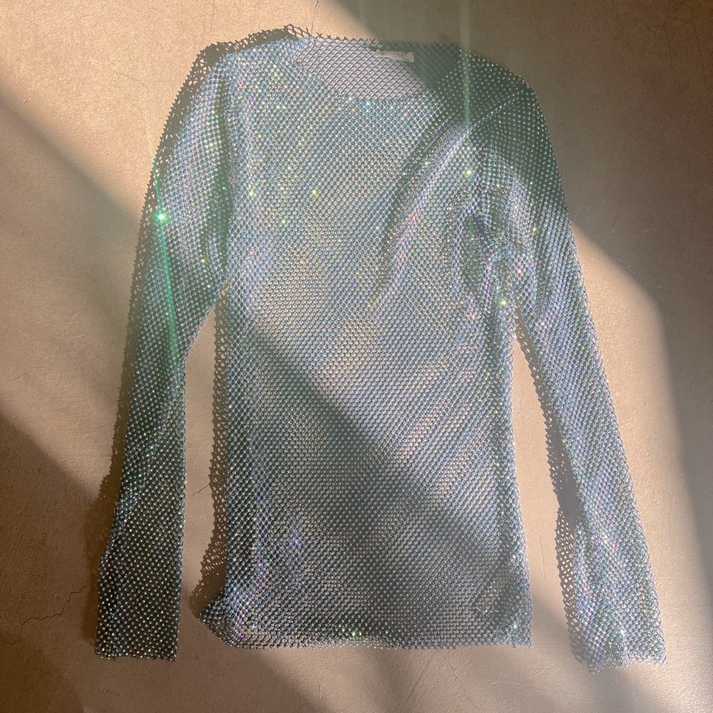 Filter Finish top by free people.